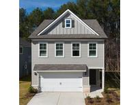Charming two-story home with gray siding, white trim, and an attached garage, perfect for a Gathering at 1094 Georgian Point Rd, Lawrenceville, GA 30045