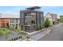 Contemporary home with a rooftop terrace and modern landscaping at 105 Channing Ln, Fayetteville, GA 30214