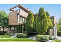 Contemporary home featuring wood-like siding, geometric design and lush landscaping at 238 Olympic Pl, Decatur, GA 30030