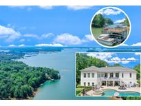 Stunning lakeside home with boat dock, pool, and beautiful landscaping at 5040 Blackberry Ln, Buford, GA 30518