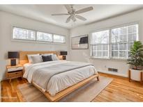 Bright bedroom with hardwood floors, modern decor, and a comfortable platform bed at 425 Lindbergh Ne Dr # A2, Atlanta, GA 30305