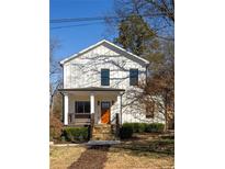 Charming two-story home features a quaint front porch and inviting curb appeal at 624 3Rd Ave, Decatur, GA 30030