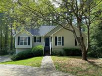 Charming one story home features mature trees, a walkway and a driveway in a lovely location at 4201 Salisbury Nw Ct, Kennesaw, GA 30152
