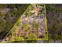A beautiful lot surrounded by lush trees, ready to be built with your dream house at 150 Hillred Dr, Fayetteville, GA 30215