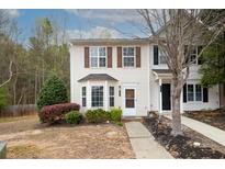 Charming two-story home featuring a bay window, well-maintained landscaping, and a welcoming entrance at 747 Crestwell Sw Cir, Atlanta, GA 30331
