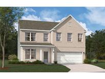 Two story home featuring a two-car garage, light brick facade, and professionally landscaped yard at 608 Belshire Dr, Acworth, GA 30102
