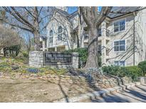 Stone sign at The Habersham of Buckhead private residence with manicured landscaping in front at 3655 Habersham Ne Rd # 227, Atlanta, GA 30305