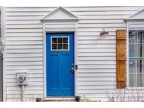 Charming blue front door featuring glass panes and a decorative white trim at 3544 Kennesaw Station Nw Dr, Kennesaw, GA 30144
