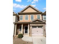 Charming two-story home with attached one car garage, brick accents and neutral siding at 2382 Capella Sw Cir, Atlanta, GA 30331