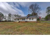 Charming single story home with stone accents and inviting front porch at 2375 Gum Creek Rd, Oxford, GA 30054