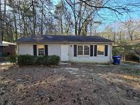 Charming single-story home featuring a classic brick facade and neatly trimmed front yard at 2909 Diana Sw Dr, Atlanta, GA 30315