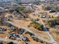 Gorgeous aerial view of neighborhood showcasing the property and surrounding landscape at H-5422 Hill Sw Rd, Powder Springs, GA 30127