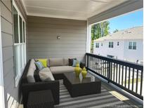 Relaxing patio with comfortable seating and a view of the surrounding neighborhood at 1915 Cassia Aly, Kennesaw, GA 30144