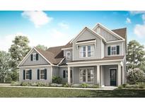Charming two-story home featuring gray siding, dormers, shutters, and a welcoming covered front porch at 2714 Byess Ct, Marietta, GA 30064