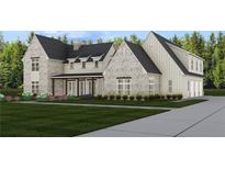Magnificent stone and siding exterior with a spacious front lawn and charming covered porch at 6206 Cedarcrest Nw Rd, Acworth, GA 30101
