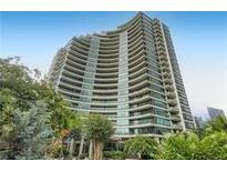 Stunning condominium building featuring a modern design and private balconies overlooking the surrounding landscape at 700 Park Regency Ne Pl # 603, Atlanta, GA 30326