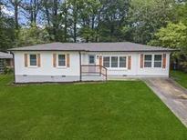 Inviting home exterior with manicured lawn and charming curb appeal at 2478 Graywall St, Atlanta, GA 30344