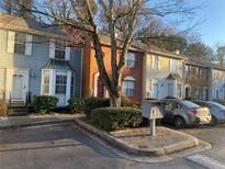Charming townhomes in a well-maintained community with assigned parking spaces at 6438 Wedgeview Dr, Tucker, GA 30084