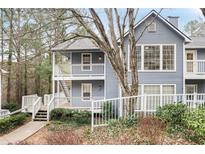 Charming two-story condo with inviting balconies and a well-maintained exterior at 1205 Gettysburg Pl, Sandy Springs, GA 30350