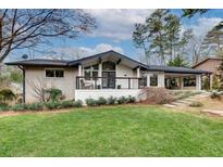 Charming single story home with a well maintained lawn and front porch at 2680 Braithwood Ne Rd, Atlanta, GA 30345