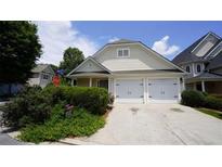 Charming home with a two-car garage and well-maintained landscaping at 536 Highland Falls Dr, Hiram, GA 30141