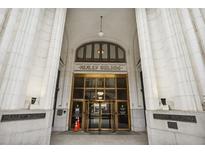Ornate entrance to the Healey Building featuring marble columns and gold-trimmed doors at 57 Forsyth Nw St # 4H, Atlanta, GA 30303