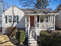 Charming single-Gathering home with a cozy front porch and freshly landscaped front yard at 1636 Stanwood Se Ave, Atlanta, GA 30317