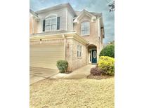 Charming brick front home with two-car garage and manicured landscaping at 206 Glen Ivy # 2, Marietta, GA 30062