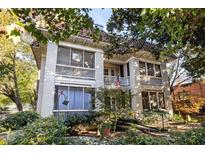 Charming two-story house with a red tile roof and lush landscaping in a neighborhood at 745 Monroe Ne Dr # 10, Atlanta, GA 30308
