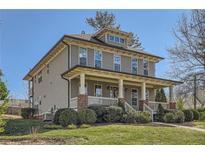Charming two-story home with a welcoming front porch and well-manicured lawn at 2987 Jefferson St, Atlanta, GA 30341