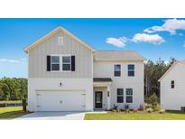 Charming two-story home with white siding, black shutters, and a well-manicured front lawn at 201 Groveton Ct, Euharlee, GA 30145