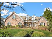 Charming brick home with manicured lawn and inviting entryway, perfect for curb appeal at 1561 Annapolis Way, Grayson, GA 30017