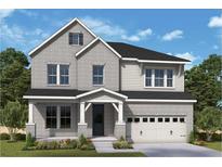 Charming two-story home with gray brick and siding, a covered porch, and an attached two-car garage at 206 Wild Ginger Bend, Woodstock, GA 30188