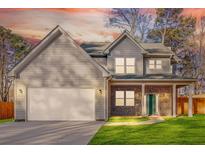 Beautiful two-story home featuring a spacious garage and a welcoming brick-accented porch at 4806 Forest Trl, Douglasville, GA 30135