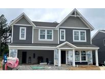 Two-story home featuring gray siding, white trim, and an attached garage at 116 Cherry Glen Way, Euharlee, GA 30145