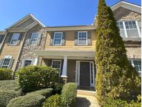 Charming home with stone and siding exterior, landscaped yard, and welcoming entryway at 585 Mcwilliams Se Rd # 2602, Atlanta, GA 30315