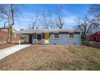 Charming single-story home featuring a covered parking area and freshly painted exterior at 1798 Giben Rd, Atlanta, GA 30315