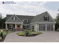 Charming home with a two-car garage, well-maintained lawn and mature landscaping at 546 Palm St, Holly Springs, GA 30115