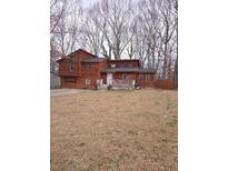 Charming two-story home with a wooden deck and front yard at 805 Wayside Dr, Lawrenceville, GA 30046