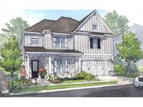 Charming two-story home featuring stone accents, a welcoming porch, and an attached two-car garage at 723 Crest Line W Trl, Powder Springs, GA 30127
