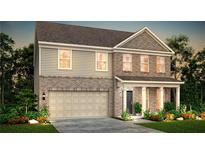 Charming two-story home with brick and siding, attached garage, and covered front porch at 371 Foxglove Way, Mcdonough, GA 30253