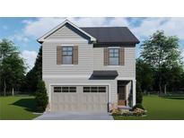 Charming two-story home featuring a gray exterior, shutters, attached garage, and well-maintained landscaping at 4371 Portsbrook Ave, Snellville, GA 30039
