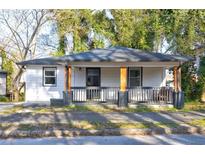 Charming bungalow-style house with a welcoming front porch and freshly painted exterior at 1108 Sw Welch Sw St, Atlanta, GA 30310