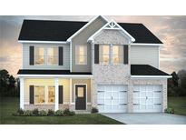 Charming two-story home boasts brick and neutral siding and a two-car garage at 1587 Sungrown Way, Mcdonough, GA 30253