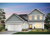 Charming two-story home featuring a two-car garage, welcoming front porch, and manicured landscaping at 1625 Tide Mill Rd, Cumming, GA 30040