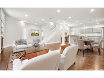 Bright living room featuring hardwood floors, modern furnishings, and an open-concept design at 789 Cooper Sw St, Atlanta, GA 30315