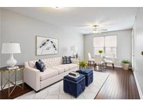 Beautiful living room showcasing a stylish sofa, chic decor, and natural light at 390 17Th Nw St # 4057, Atlanta, GA 30363