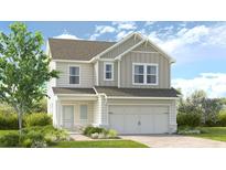 Charming two-story home with vertical siding, a two-car garage, and a well-manicured lawn at 211 Groveton Ct, Euharlee, GA 30145