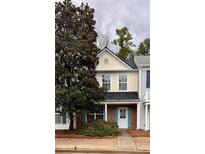 Charming two-story home with a welcoming front porch and well-maintained landscaping at 51 Highoak Ne Dr # 12, Marietta, GA 30066
