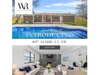 Inviting home featuring a beautiful pool and comfortable outdoor living space, perfect for relaxation and entertainment at 897 Marie Lane Sw Ln, Conyers, GA 30094